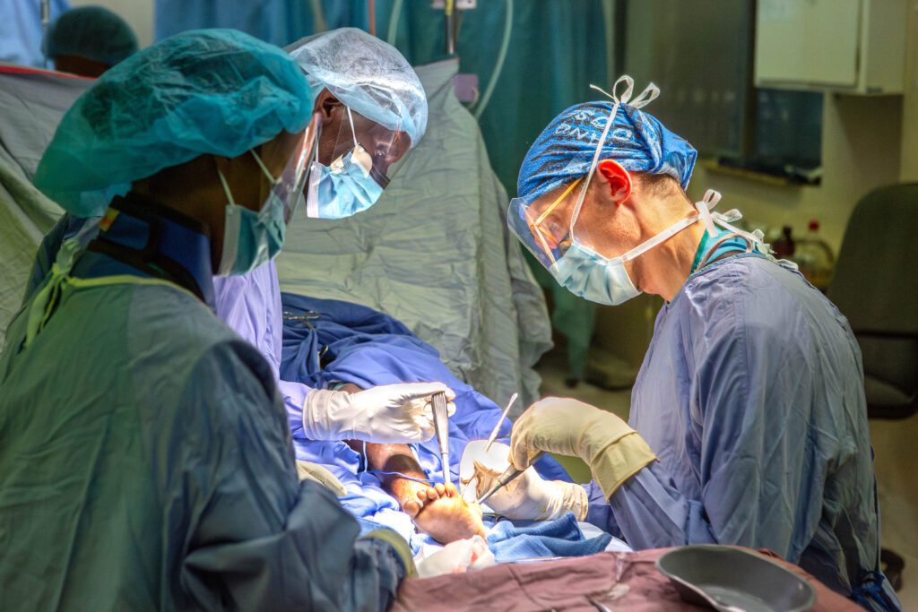 Doctors performing Tamirat's surgery