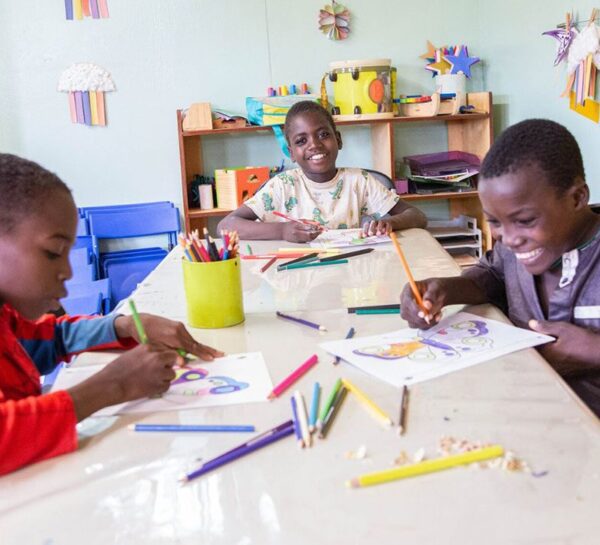 three children coloring