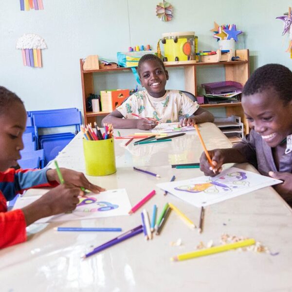 three children coloring