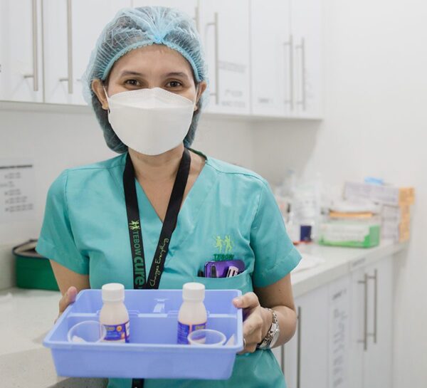 Doctor holding vitamins tray