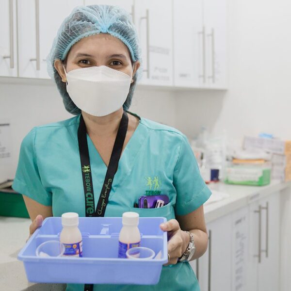 Doctor holding vitamins tray